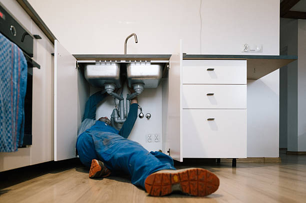 Professional Emergency Plumber technician working in Bedford, IN